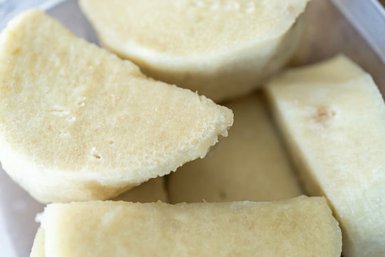 Nigerian boiled yam in plastic container