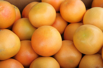 Fresh grapefruit on a street market stall	