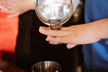 bartender preparing mocktail beverage