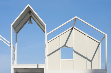architecture modern white steel frame decorate at the park on blue sky background.