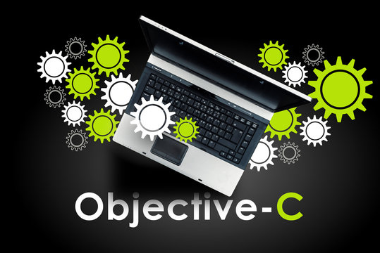 Objective-C programming language. Laptop on word Objective-C.
