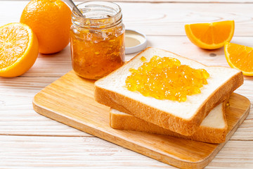 Slices of bread with orange jam