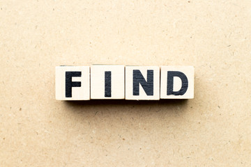 Letter block in word find on wood background