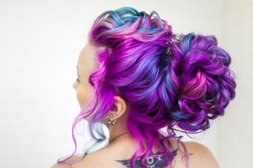 Incredible hair color, bright blue and Magenta gradient. Stylish fashionable hair coloring.