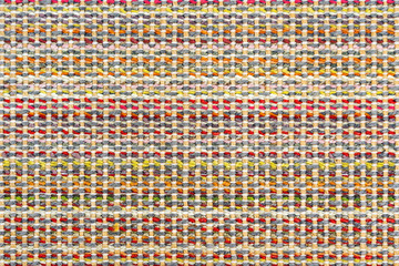 Multicolored knitted fabric background texture. Сolorful fabric with a pattern, Fragment colored...