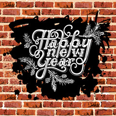 Happy New Year vintage text isolated on brick wall background. Hand drawn celebration lettering. Postcard motive.