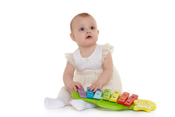 Little baby with educational toys.