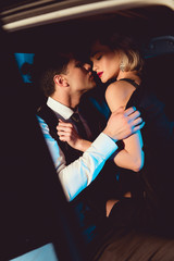 beautiful sensual young woman hugging handsome man