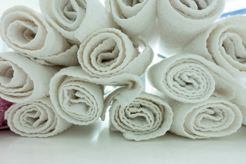 roll up  Hand towels on white table