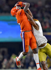 Football players making amazing playing during a football game