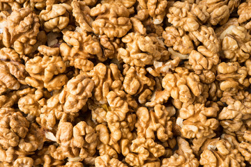 Walnuts background. Kernels walnuts. Top view. Vegetarian or healthy eating.