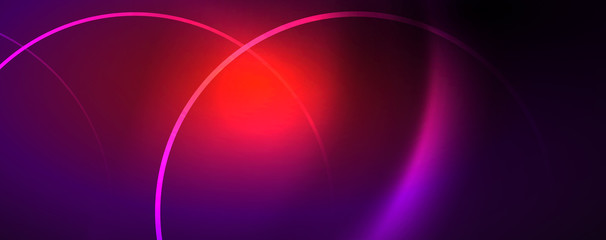 Shiny neon lights, dark abstract background with blurred magic neon light curved lines