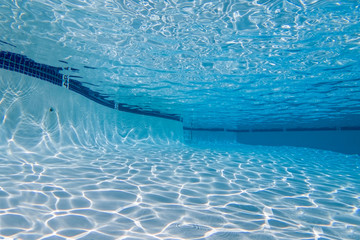 Underwater view in nice clean swimming pool.