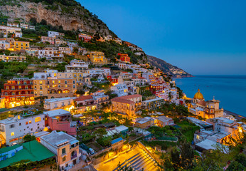 Fototapeta na wymiar Panoramic view of the beach anf colorful buildings in Positano at Amalfi Coast, Italy.