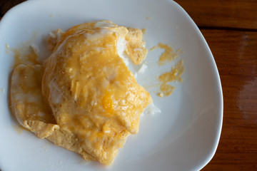 Creamy Omelette with steamed rice on dish