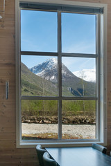  Beautiful view of the nature landscape with snowy mountains from the window, restaurant, cafe, hotel, guest house