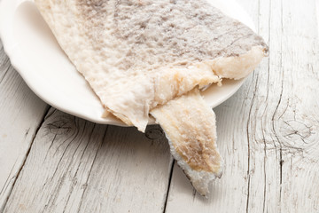 Slice of raw salted codfish