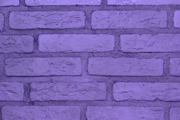 creative old purple brick wall texture for design purposes.