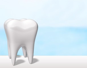 White tooth on desk, dentist concept