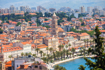 Old town of Split in Dalmatia, Croatia. Parnoamic view of city center, palace of Roman emperor Diocletianus and catherdal. Popular tourist destination in Europe.