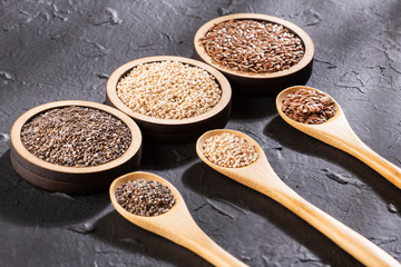 Quinoa, flaxseed and chia - Organic seeds. Superfoods. Text space