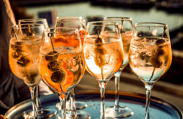 tray with several cocktail glasses