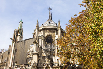Notre-Dame de Paris against the blue sky before the destruction and fire in Paris, France. Ancient...