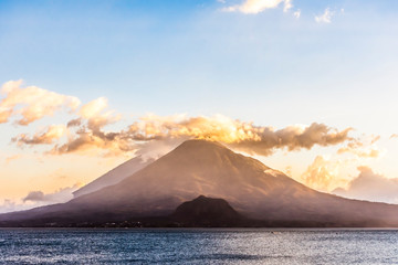 Sunset view over Lake Atitlan & Toliman & Atitlan volcanoes in Guatemalan highlands, Central America