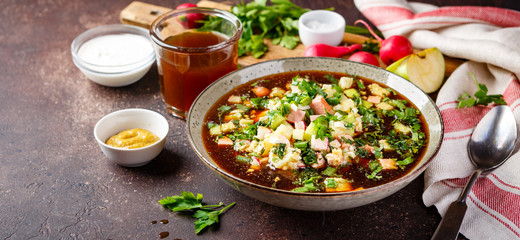 Cold Soup Okroshka with sausage, vegetables and kvass