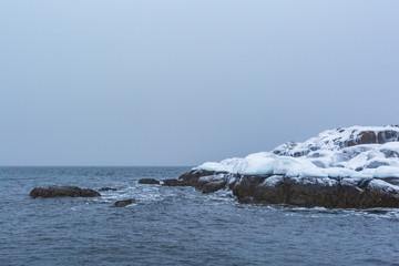 Barents Sea shore. Kola Peninsula winter landscape