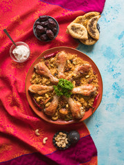 Arabic traditional food bowls Kabsa with meat