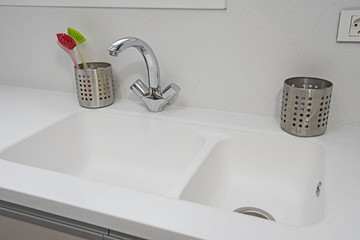 Modern kitchen sink design in a luxury apartment