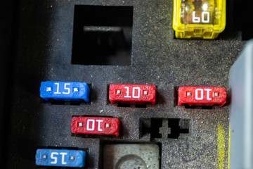 blade style automotive fuses in a fuse distribution box