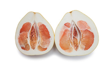 cut in two halves ripe pink pomelo on white background isolated with shadow