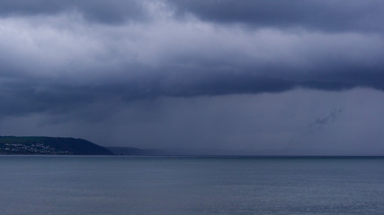 Storm on the horizon over the ocean