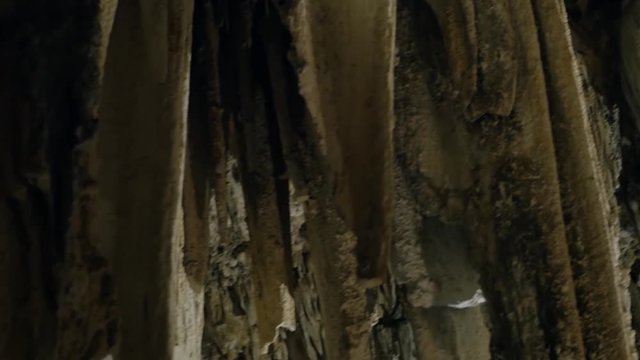 panning and tilting along some abstract rockformations in the dripstone cave of nerja