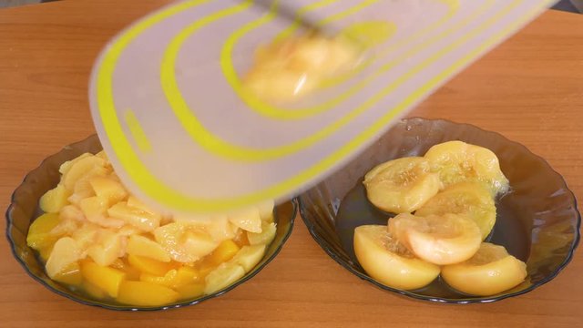 cut into halves of peach and put in a plate