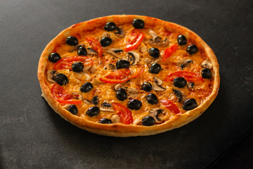 pizza, mushrooms, olives, chicken, tomato sauce, cheese (pizza ingredients). hot pizza. Top view. copy space