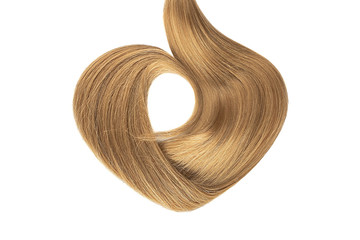 Brown hair isolated on white background. Heart shape