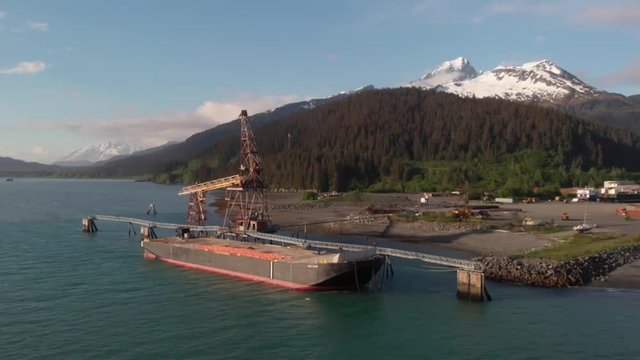 Alaskans subsistence fishing off a barge 