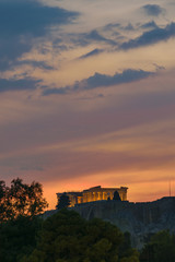 Obraz premium Acropolis, Parthenon view from Panathenaic stadium (Kallimarmaro) at sunset, with colorful sky, Athens, Greece