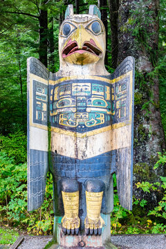 Eagle Grave Marker Totem Pole at Totem Bight State Historical Park, Ketchikan, Alaska. Native American tradition. Totem animals act as guardian spirits.