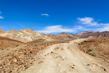 Path in the mountains of Artist's Palette in Death Valley National Park, California, USA.