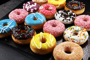 donuts in different glazes with chocolate