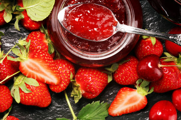 assortment of jams, seasonal berries, apricot, mint and fruits. marmalade or confiture