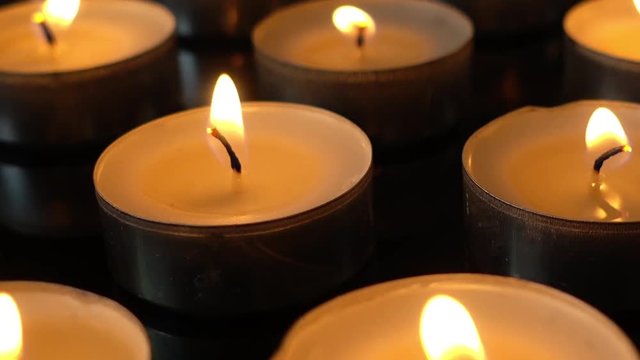 Candles on a black background.