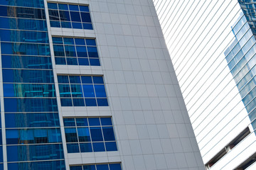 modern glass and steel office buildings low angle view at Jakarta, Indonesia