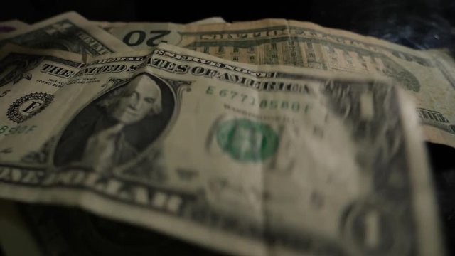 Dollar bills, money background. Dollars money set Slow Pan With Shallow Dof and smoke. Dollars, money close up.