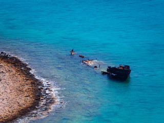 Large sunken ship in the shallows, Crete, Greece