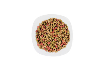 Ceramic bowl full of dried food for cat or dog isolated on white background. Top view. Animal protection concept